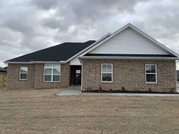 Newer construction 4 bed 2 bath home located directly behind the new Pea Ridge High School and only minutes from Bentonville! Features include custom cabinets, large kitchen island, upgraded 3cm granite & fixtures, gas cook top with built in oven, wood look ceramic tile floors, custom tile shower, whirlpool tub, raised ceilings, 2'' faux blinds, covered patio, & much more! *