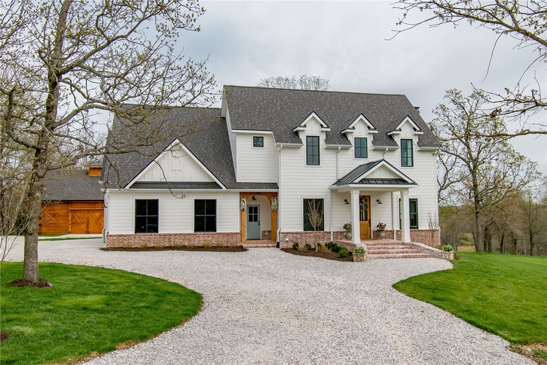 Amazing country estate featuring a 3600 square foot custom-built home sitting on 53.45acres.  Home was built by Jeff Martin with great attention to detail w/English Country, open, airy details.  Volume ceilings w/formal dining room, living room w/FP that flows into gourmet kitchen & casual dining area.  Upstairs features 3 BR, 2 w/ensuite BA, 1 w/Hollywood.  There is a quaint gathering area perfect for entertainment or home office.  Custom barn could easily be finished for guest quarters.  Architectural drawings for wedding venue opportunity.  Drone footage available. Must see to appreciate!
