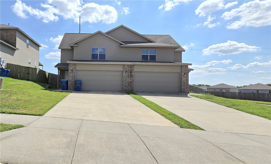 Configuration: One duplex side
Bedrooms: 3
Bathrooms: 2.5
Kitchen/Living Area: Open layout design
Garage: 2-car garage
Outdoor: Fenced backyard - PET FRIENDLY!
Major Appliances: Washer/dryer set, stove, refrigerator, & dishwasher included.
Benefits:

Close to a variety of dining locations
Short drive to nearby parks
6 minutes from Bentonville West Highschool
8 Minutes from downtown Bentonville

This spacious duplex side unit offers a comfortable and inviting living space with modern amenities, making it an ideal home for families and individuals alike. Don't miss the opportunity to live in a vibrant community with convenient access to local dining and recreational options. For more details or to schedule a viewing, please contact us today.