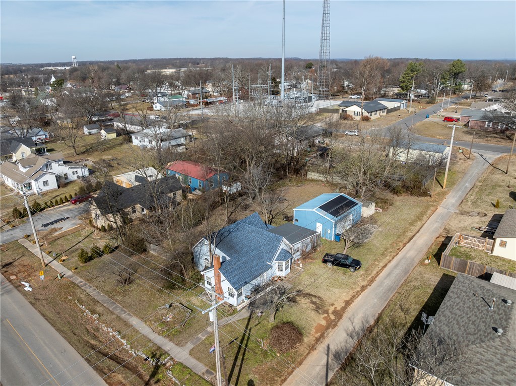 Attention investors ! Check out this 0.42 acre corner lot, close to schools and downtown, across the street from a city park, 24 x 30 metal shop and close to schools. Roof in 2025, HVAC 2020, Solar panels 2020. This has so much potential. There is potential for this lot to be split into multiple lots if the new ordinance passes in June per planning department. Remodel the existing home, add an ADU to maximize value or split and build additional or all new multi-family. Buyer to confirm what the planning options are. Don't miss your opportunity on this growing little town!