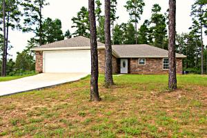 Beautiful brand new mountain top home priced here with 2.14 acres.  The open floor plan is ultra modern and the view is beautiful.  There are 3 bedrooms including a nice master with an amazing closet, stained concrete floors, beautiful counter tops, and more!