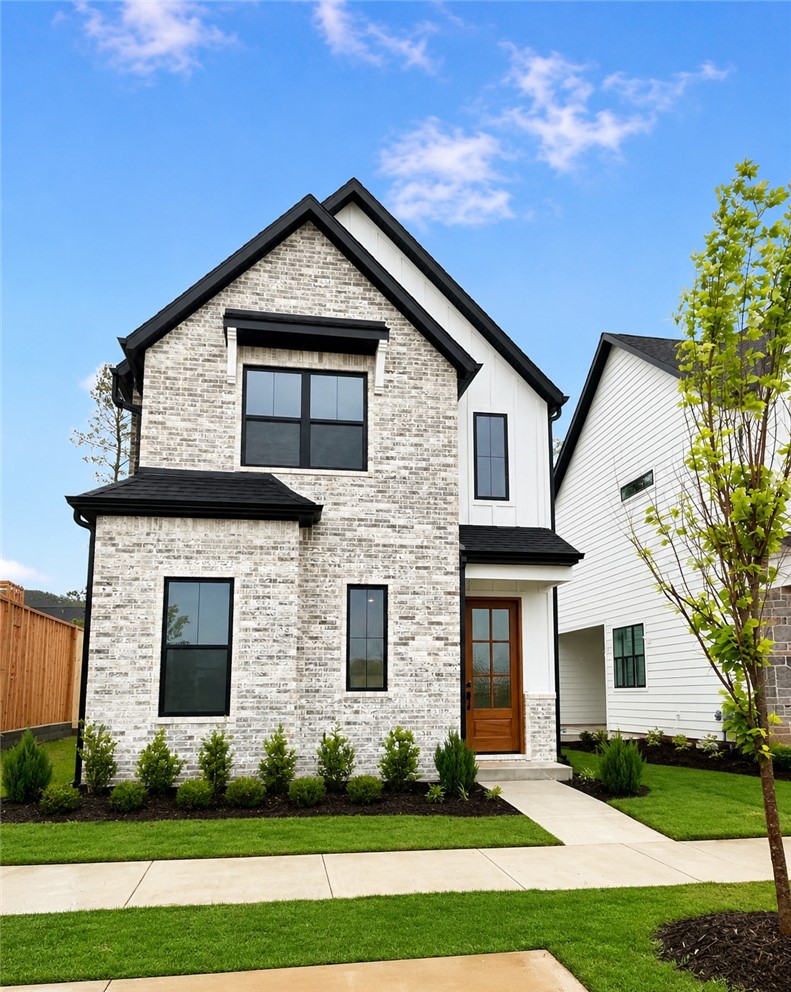 Welcome to the Oxford Cottage Home @ The Village at Pinnacle Hills, where luxury meets convenience. This highly desirable community is located across from Pinnacle Hills Promenade, walking distance to Target, shopping, restaurants, & NWA's Ozark United FC, upcoming professional soccer stadium. This beautiful new construction thoughtful designed, two-level residence offers 3 bedrooms, 2.5 baths, 1800square feet. Home offers open concept layout, connecting the kitchen, dining, & living areas perfect for everyday living & entertaining. The designer kitchen features high end finishes, quartz counters, over-sized island, professional level appliances, & a spacious walk in pantry. Second level includes private primary bedroom w/ en suite, over-sized walk-in closet, laundry room for added convenience, two additional bedrooms/office/bonus space. Main floor offers open floor plan, covered patio, mud room, 2 car garage, & half bathroom. Home is directly across from new pickle ball courts & green space. POA maintains lawn.