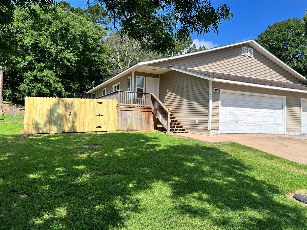 Available today, This clean 3 bedroom, 2 bath, 2 car garage. Freshly painted through out, new granite counters in kitchen and baths, tile flooring through out entire home. Kitchen offers new range, dishwasher with plenty of cabinets and counter space,  all 3 bedrooms are good size with nice size closets. 10 min to U OF A. This home will not last. $40 application and processing fee per adult, pets are negotiable, No Cats.