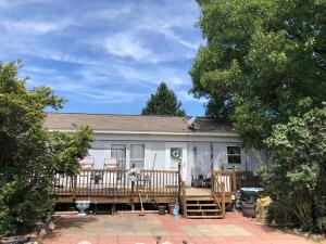 Beautiful acreage with pasture, forest, and views! Paved road with great location between Harrison, Ar and Branson, Mo and within 20 minutes of Table Rock Lake! Property features a 1989 3BR 2BA and 1982 2BR 2BA mobile homes, approx. 30x50 newer metal barn, fruit trees, flowers, shrubs, large trees, livestock waterer, pasture fence. Secluded setting! Come check it out!