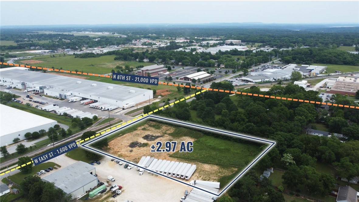 - Currently zoned I-1
- Flat & developable
- Located within the north Rogers Opportunity Zone
- Water & Sewer are located on an adjacent parcel
- A 2-minute drive from 71-B and an 8-minute drive from I-49