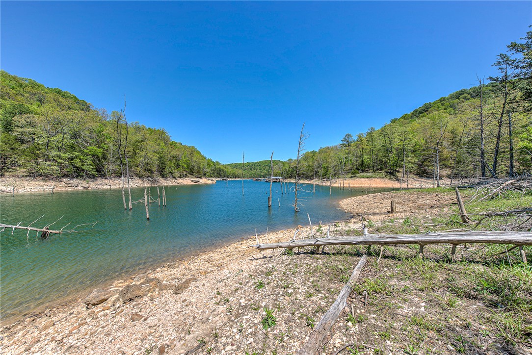 Imagine your custom lake home perfectly positioned to capture sweeping views of Beaver Lake. With scenic lake views, steps leading down to the shoreline, and an exceptional building sites, this property offers an incredible opportunity to create the lake lifestyle you've always envisioned.
Whether you're dreaming of a luxury waterfront retreat, a weekend getaway for family and friends, or a private escape surrounded by the tranquility of nature, this property provides the ideal setting. Enjoy breathtaking scenery, peaceful surroundings, and the freedom to design a home that is uniquely yours—where every day feels like a vacation on Beaver Lake.