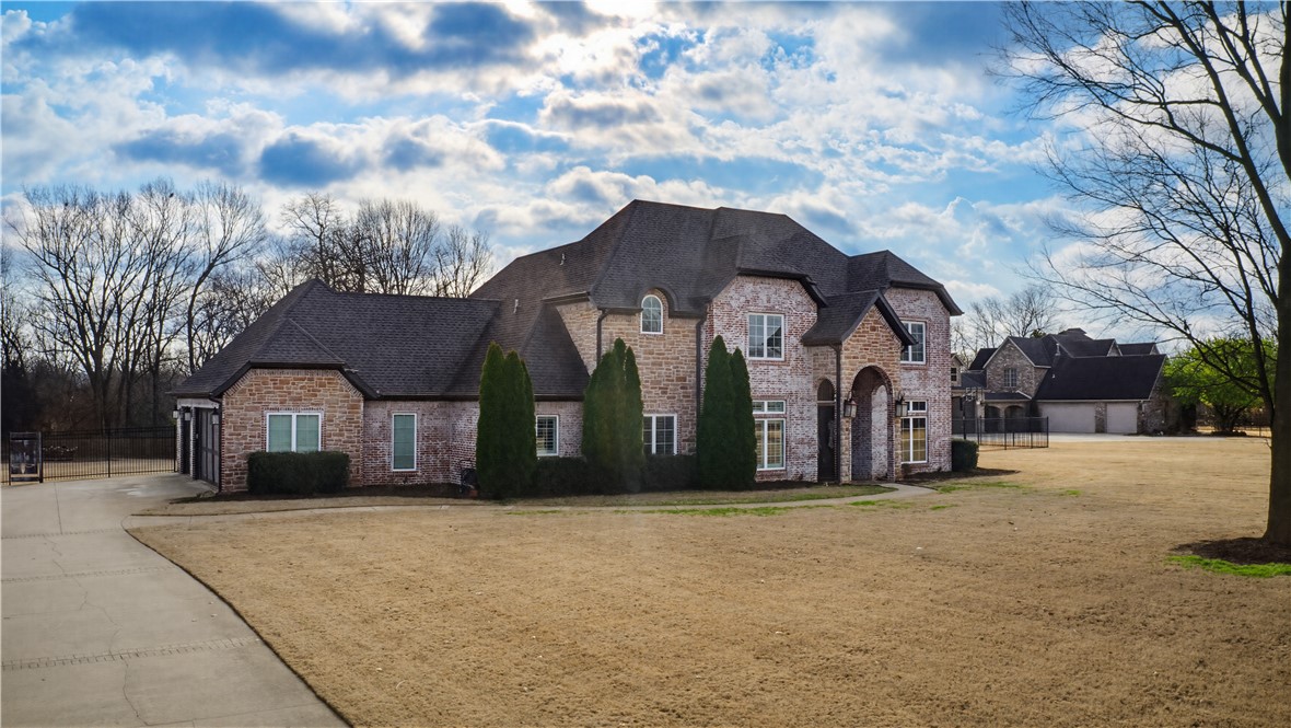 Located in the prestigious gated community of Polo Estates, this beautifully updated 3,575 sq ft home sits on approximately 2 private acres, offering space, comfort, and refined living in one of Fayetteville’s most desirable neighborhoods.
The thoughtfully designed split floor plan features a recently updated kitchen that anchors the home and opens to the main living and dining spaces.
The main level features a spacious primary suite, an additional en-suite bedroom, a private office, spacious mudroom and updated laundry room, and a coffee bar (with wine fridge and ice maker). Upstairs offers a large bonus or game room and two additional bedrooms, including one en-suite, and 1 additional full bathroom.
Step outside to enjoy a beautiful patio with an outdoor fireplace, perfect for entertaining or relaxing while taking in the privacy and space of the expansive backyard.
A rare find combining privacy, updates, and luxury living in a sought-after gated community.  Fayetteville School Zone.