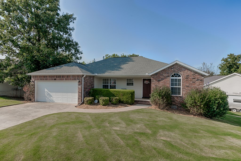 Great location in North Bentonville, easy access to downtown. Cathedral ceiling and wood floors in the living room, new carpet in the bedrooms. Split floor plan, spacious kitchen. Covered front porch, and a big fenced backyard with large deck overlooking the fire pit. Great family home in a fantastic location.