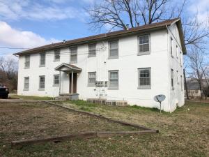 4 units in this 4 plex that rents for 1,890.00 per month each unit is 2 bedrooms 1 bath central gas heat and Central air good location. each unit pays there on utlities stove washer and dryers and refrigerators in each unit gas water heaters parking garages for each unit.