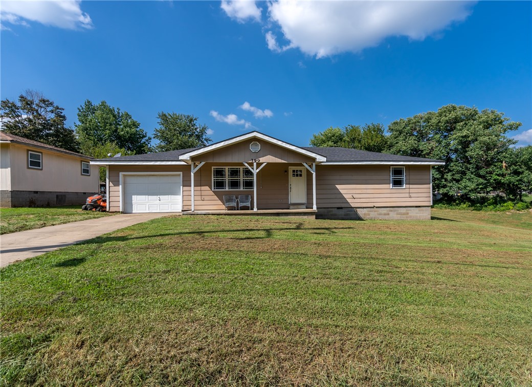 3 Bed 1 1/2 Bath on a large lot with one car garage. New back door in 2023, new A/C in 2020, new roof, interior doors, front door, wood look vinyl, electric stove and interior paint in 2019. This is a great home for a first time home buyer or investor. Has a large covered front porch, fenced backyard, good size bedrooms, double sinks in the bathroom and ceiling fans through out. The half bath is off the laundry room. The septic was cleaned out in 2022. This won't last long!