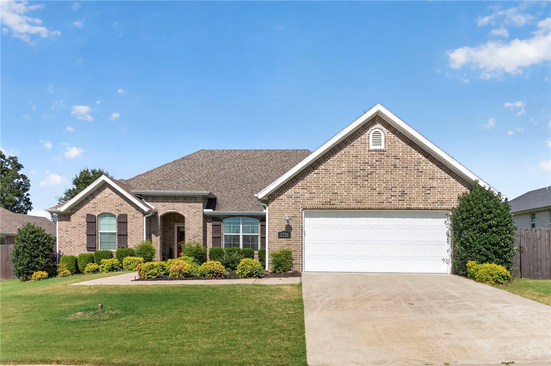 Welcome to the highly sought-after Hughmount Subdivision! This beautiful all-brick 3-bedroom, 2.5-bath home offers an open-concept floor plan with cathedral ceilings, crown moulding, and abundant natural light. The kitchen features granite countertops, stainless steel appliances, and a pantry, flowing seamlessly into the spacious living and formal dining areas. Enjoy hand-scraped hardwood floors, ceramic tile, and carpet throughout, along with generously sized bedrooms and walk-in closets. Step outside to relax on the screened-in back porch or entertain on the adjoining deck while taking in the beautiful views. Residents enjoy access to a community swimming pool and are just minutes from parks, schools, shopping, and walking and biking trails. Conveniently located near Clabber Creek Trail and only 4 miles from Centennial Park, this home offers easy access to everything Northwest Arkansas has to offer. Don't miss this exceptional opportunity!