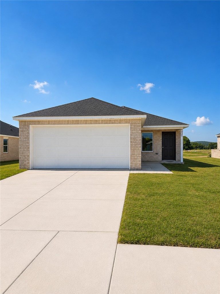 BRICK HOME! Welcome to The Idlewood, a beautifully designed new construction home offering 1,411 sqft of comfort and smart living. With 3 bedrooms, 2 full bathrooms, and a 2-car garage, this home perfectly balances style and convenience. Step inside to an inviting open-concept layout that seamlessly connects the living, dining, and kitchen. The kitchen is thoughtfully appointed with sleek cabinetry, modern appliances, and generous counter space, creating a true centerpiece for the home. The private primary suite provides a peaceful retreat, complete with a well-designed en-suite bathroom and ample closet space. Two more bedrooms offer versatility for guests, a home office, or whatever suits your lifestyle. Built with today’s homeowner in mind, The Idlewood features energy-efficient construction and low-maintenance living, giving you both comfort and peace of mind. Experience the perfect blend of quality craftsmanship and contemporary design—The Idlewood is ready to welcome you home.
