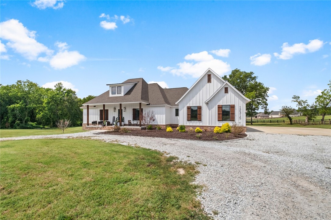 Welcome to the Fairmont Road community where the perfect combination of country charm and modern convenience collide! Welcome to the beautiful 4-bedroom, 3-bath home with two spacious living areas. 3 acres mol. The home offers natural light throughout, chef kitchen, energy efficient windows, tankless/instant hot water heater, open floor plan, ready to entertain your family/friends for all your events. A short commute to Bentonville, Siloam Springs, Springdale and XNA airport this property offers spacious living, a gourmet kitchen, and a luxurious primary suite, pantry is also a safe room. Available as a turn-key package with furnishings and hot tub up for further negotiation(s),—just bring your clothes and move right in! Freshly painted interior. Hot tub stays with home.