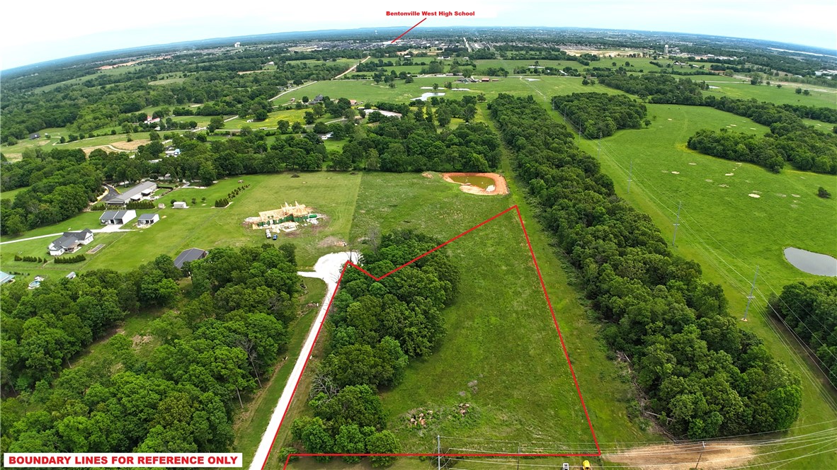 4.14-acre lot, ready for building your dream home! Mature trees line the back side & a section near the road for seclusion, yet the lot is open, and easy to begin construction quickly. This platted-out subdivision is close to I49 and Bentonville, Bella Vista, and Centerton areas-only 16 minutes to the Walmart Home Office, 9 minutes to Bentonville West High School, and 15 minutes to XNA. Bentonville Schools! This property is truly centrally located to anywhere in Benton County. Covenants include no mobiles. Electric and Centerton Water are available at the street, septic is required. Perc test available. Starlink Internet is available, too!