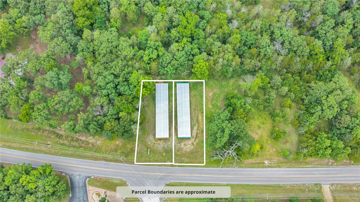 Outstanding value-add investment opportunity in Holiday Island! Situated at 199 Stateline Drive, this property offers tremendous potential for an investor, entrepreneur, or owner-operator looking to capitalize on the area's growing demand for storage. Existing improvements provide a foundation for renovation and repositioning, creating the opportunity to increase occupancy, improve rental rates, and enhance long-term cash flow. With close proximity to Table Rock Lake and the recreational amenities that attract both residents and visitors, there may also be potential to expand services through the addition of boat storage, subject to buyer verification and any applicable approvals. Whether you're looking to renovate, modernize, or expand, this property presents a rare chance to create additional value and establish a strong income-producing asset in a desirable Northwest Arkansas location. Excellent opportunity for investors seeking upside potential and multiple avenues for future growth