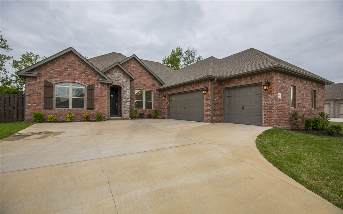 Impeccably maintained 2016 Build Full Brick home with 4 Bedrooms 2.5 Baths and 3 Car Garage in North Fork Subdivision.  Covered back patio and large private backyard with greenspace behind.   Open concept home with stunning kitchen that includes-gas cooktop, large center island, subway tile and granite countertops. Finished out with beautiful hardwood floors and modern gray colors.  Bentonville School District.