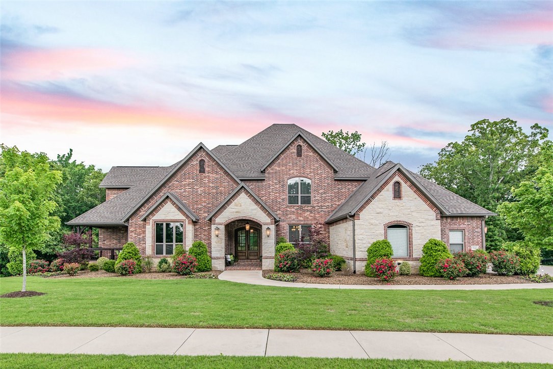 Custom 7,639sf home offers 5 bed/6 bath with all of the high end features buyers seek. Hand scrapped wood floors, crown molding, Thermadore appliances, wired for sound, vaulted/beamed ceilings, upgraded security, central vac.  Living room with wall of windows, covered patio w/built-in grill. Kitchen comprises upgraded appliances, granite, glass tile backsplash 2 islands, butler's pantry w/back-lit cabinetry and beverage fridge & ice maker. Master suite offers private cofffee/wine bar, vaulted ceilings, sitting area, & exquisite master bath. No detail left out and many custom features! Must SEE!