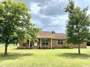 Why settle, when you can settle in? Get ready to fall in love with this adorable, country Pottsville home. It sits on a large corner lot that is private and beautiful.  Enjoy your evenings by the fire pit or watching the storm roll in under the back covered porch. The floor plan is open and split, perfect for entertaining! The paint and floors have been updated and you will not be disappointed! See this new listing today!