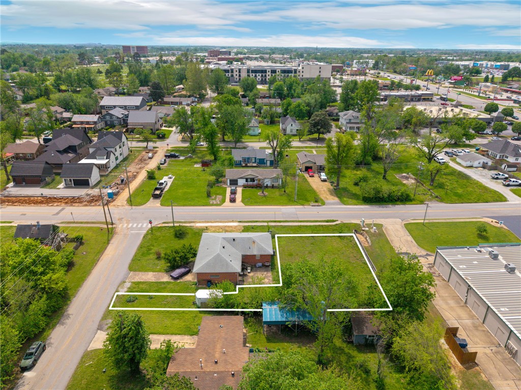 Build your dream in the heart of downtown Bentonville on this rare, level 0.15-acre lot. Perfectly positioned within walking distance to some of the area's best shops, dining, and entertainment, this property offers both convenience and lifestyle. Surrounded by high-end restaurants and vibrant local attractions, its an ideal opportunity for a custom home, investment build or modern retreat. Enjoy the ease of a flat, build-ready lot in one of NWA's most sought-after locations, where everything you love about Bentonville is just steps away. Also listed with adjoining lot and home for $1.2M MLS#1343405