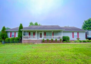Beautiful Hobby Farm! Improved 5 acres of pasture that has Hwy 62 Frontage. Nice screened in back porch. Home has beautiful kitchen cabinet with granite counter tops. Living room has a cathedral ceiling, bedrooms have walk in closets and master bedroom has large master bath. Property has 14x20 workshop and 2 sheds plus a pole shed for cows in winter time. Nice view.