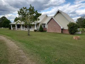 If you want to live in the country, but be close to town, here is your new home! Lovely 3 bedroom, 2 full bath home on 2.40 acres with a beautiful view of surrounding property. Also has a very nice 28 X 36 insulated shop! 2 bedrooms have very nice built-in closets with storage. i