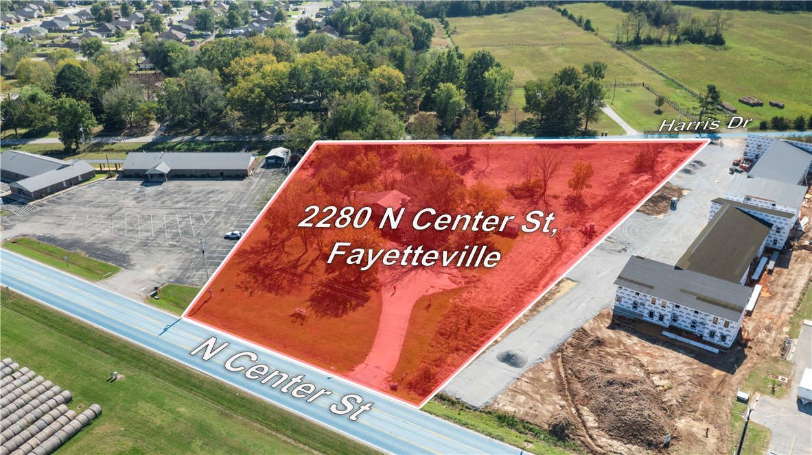Excellent Development Opportunity! 2.5 flat acres with dual road frontage—160' on Hwy 16/N Center St
and 445' on Harris Dr-offering great visibility and access. Existing 3-bedroom, 2-bath structure currently operates as office/R&D Warehouse, The property is ideal for commercial redevelopment for QSR, Restaurants, Strip Center, office spaces, or Multi Family.  Endless potential for investors.  Currently zoned residential within Elkins City. 

See Commercial listing MLS#1626025 and also Residential listing MLS #1626233