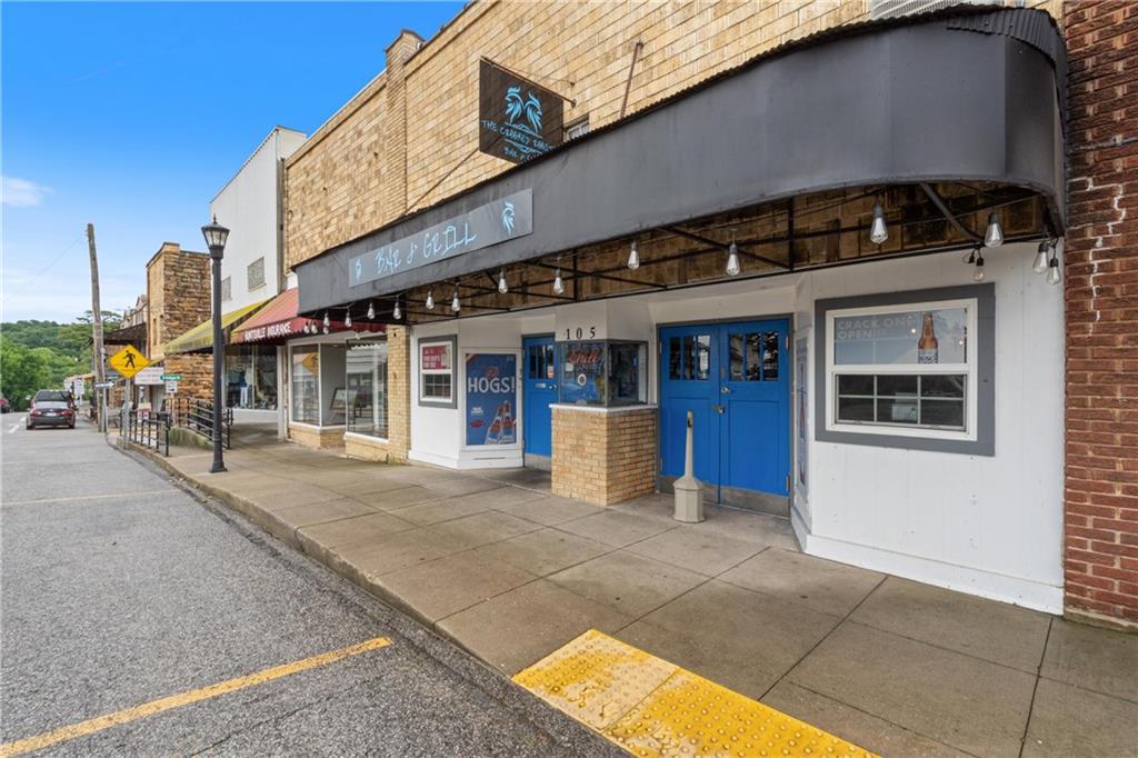 Be your Own Boss! Seize the chance to own a piece of history along with a flourishing business for just $459,000. This offer includes the historic buildings at 105 Main and 104 College, as well as a beloved restaurant and bar featuring a potentially transferable liquor license. Highly regarded by both locals and visitors, this destination brims with potential. Financial incentives such as historical tax credits may be available to assist with future renovations or expansions. The property also includes additional office space and cozy living quarters. Opportunities like this are rare step into a turnkey operation filled with character, charm, and cash flow.