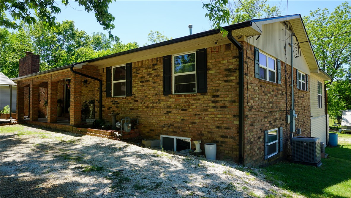 You won't run Short of room here at this spacious home in the center of Lincoln! This property offers a unique opportunity to shape your ideal living space within a generous 6 bedroom floorplan, 4 bedrooms/2 baths above and 2 beds/1 bath below in the finished basement complete with kitchen, living room, bathroom and external access. This space could be used as a separate suite or together for a massive 3426sqft total square footage.  Roof was replaced with Architectural shingles in Sept 2025 and water heater was replaced Dec 2025.

Set on a 2.57 acre lot with pond access, this property has massive potential for outdoor projects or for simply enjoying nature. The included 10x12 gazebo gives plenty of room for outdoor entertaining and the enormous back patio also has space for expansion of outdoor entertainment areas. 
It's also about 25 minutes from access to I-49. Don't miss out on this home with huge potential!