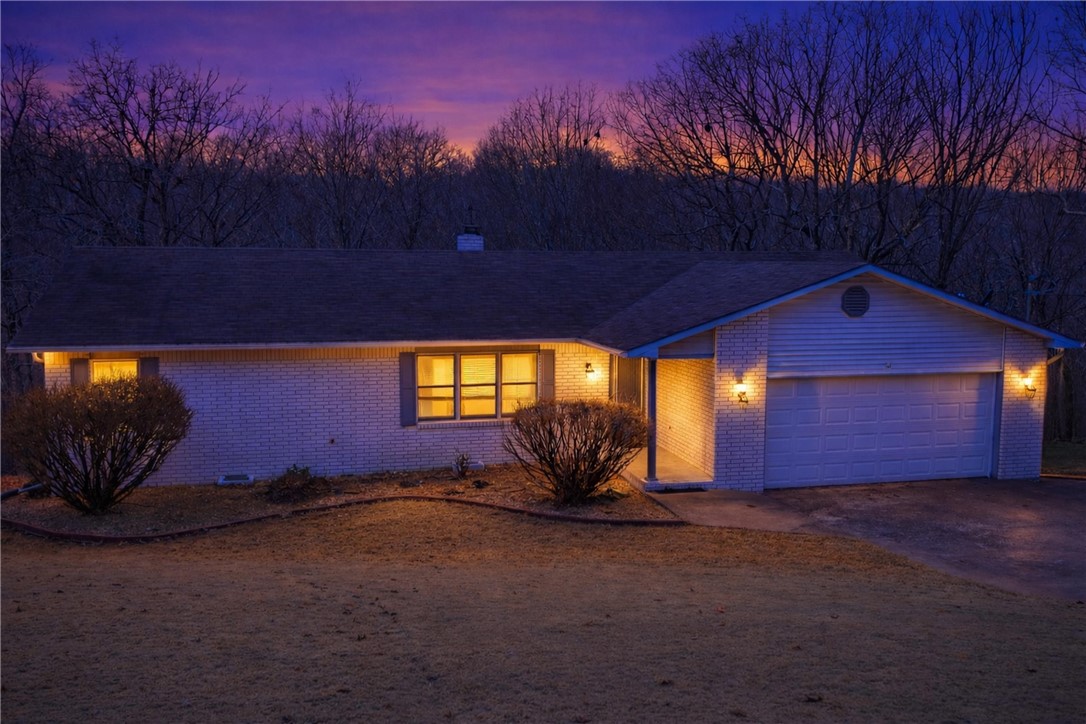 SELLERS WILL PAY $15,000 CREDIT TO THE BUYER AT CLOSING!!! CONVEYS TO NEW ROOF AND FLOORING. Ranch-style home featuring 3 bedrooms and 2 full baths with a functional, easy-living layout. The home offers a below-level basement with a dedicated workshop, ideal for hobbies, projects, or extra storage. Enjoy outdoor living on the back deck, including a partially screened section—perfect for relaxing or entertaining. The front lawn is professionally landscaped, while the backyard offers a gentle, near-level slope, providing usable outdoor space. Prairie Creek Park/Marina is only a ten-minute drive.