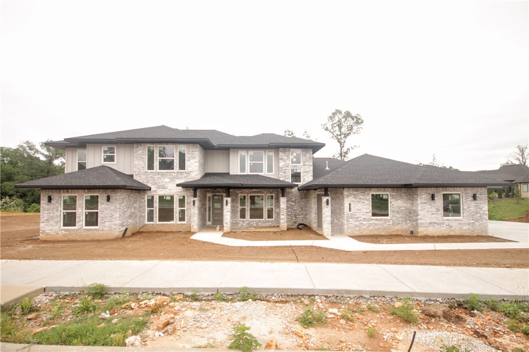 New construction masterpiece.Estate modern style home in the highly sought after gated community of Scissortail.4 car garage,large bedrms w/ their own walk-in closets & baths,bonus room w/ wet bar on the main level made for entertaining w/ access to the deck & loft/bonus upstairs.Large open floorplan with TONS of natural light and space to entertain!STUNNING contemporary kitchen with modern wood accents & designer selected features and finishes.Two dishwashers,upgraded GE Cafe appliances,double ovens, fridge,wine cooler,walk-in pantry & more.Soaring two story ceiling in the living w/ tiled fireplace,tons of windows & access to the back patio.Luxurious master bedrm w/ spa like master bath.Double vanities,soaking tub,large walk-in tile shower & massive walk-in master closet with built-ins & access to laundry rm.Study w/ french doors,formal dining & mother-in-law suite on main level.Large sliding glass doors leading to the covered patio area overlooking the massive fully sodded lot w/ built in grill/outdoor kitchen