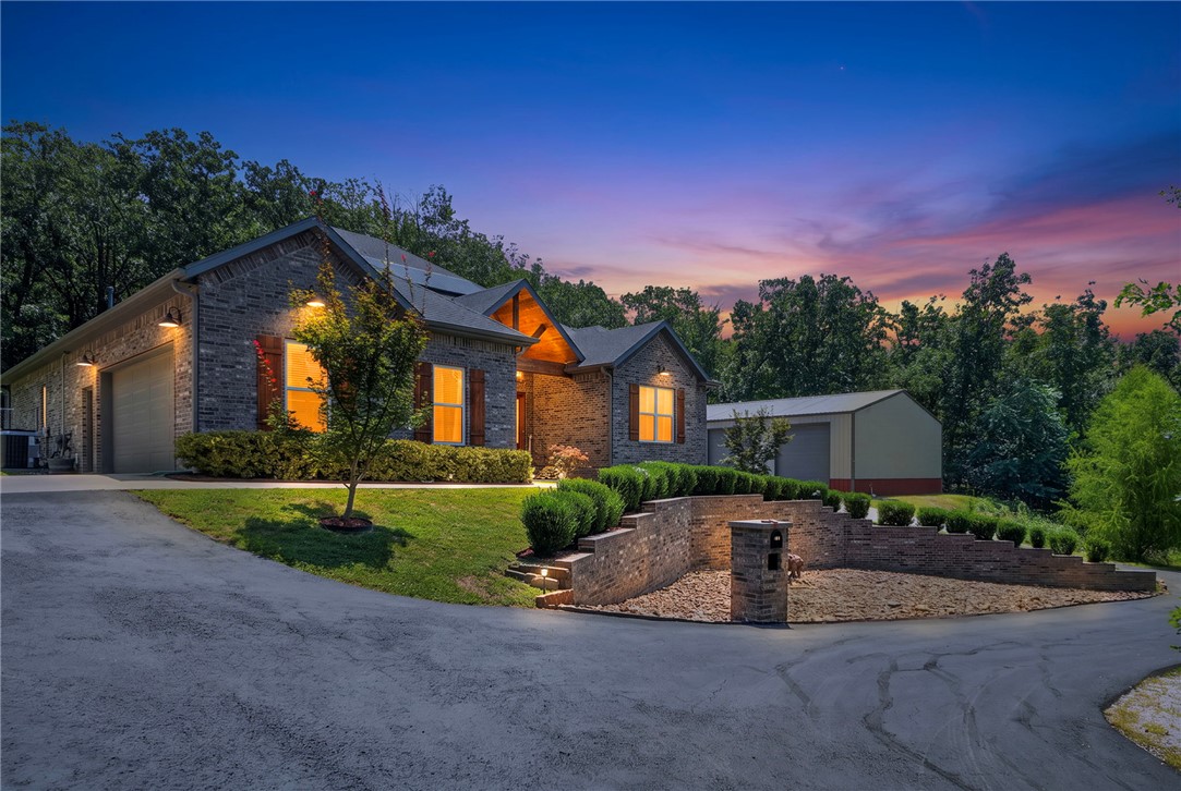 Escape to your own private retreat on 10 scenic acres backing directly to the Mount Kessler trail system. This beautifully maintained home offers the perfect blend of privacy, outdoor adventure, and exceptional amenities for work, recreation, and entertaining. Inside, you'll find warm, real hardwood floors, spacious living areas, and timeless finishes that create a welcoming atmosphere. Outside, the property is designed for those who need room to spread out, featuring an impressive 60' x 40' insulated shop with ample space for equipment, hobbies, or a home business, plus a dedicated RV parking awning with convenient access. Whether you're hiking or biking the Mount Kessler trails from your backyard, enjoying the serenity of your acreage, or taking advantage of the versatile outbuildings, this property offers a rare combination of natural beauty, functionality, and convenience just minutes from town.