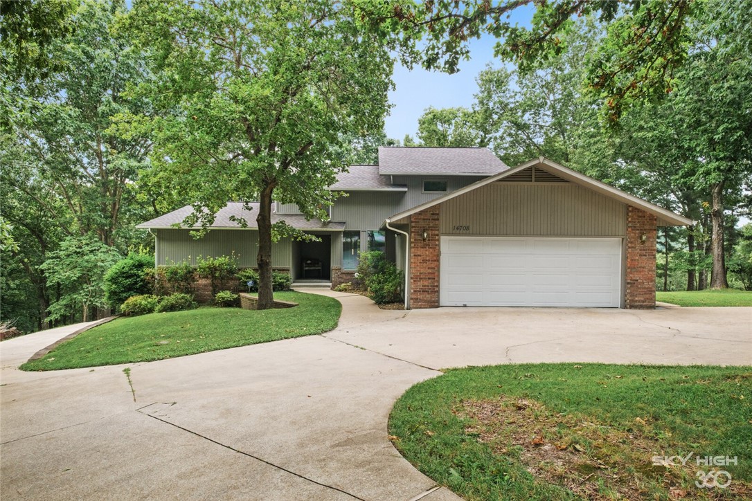 This spacious lake front home was built for entertaining!  Beautiful hardwood floors and wood accents enhance the peaceful views of this shaded lot.  The home is filled with custom cabinetry and tons of storage, 2 wood burning fireplaces as well as a large granite island in the kitchen, spacious countertops, wine fridge, hidden bar, a dedicated study and amazing master suite. The walkout basement apartment has a separate entrance, fully functional kitchen and laundry, complete with custom media room. Exterior complete with RV pad and whole house gas generator, 2 single storage bays, along with 1 slip/lift in a 2 stall dock.