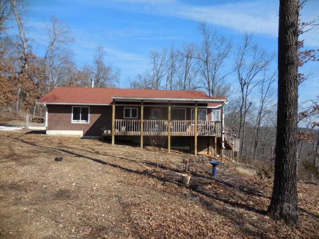 Country home with beautiful views. Rural water, septic system. 3 bedrooms, 2 1/2 baths home with ICF walls and nice front porch with walk around deck. 10 acres for your hunting and wild life watching. Secluded country setting. High speed internet.