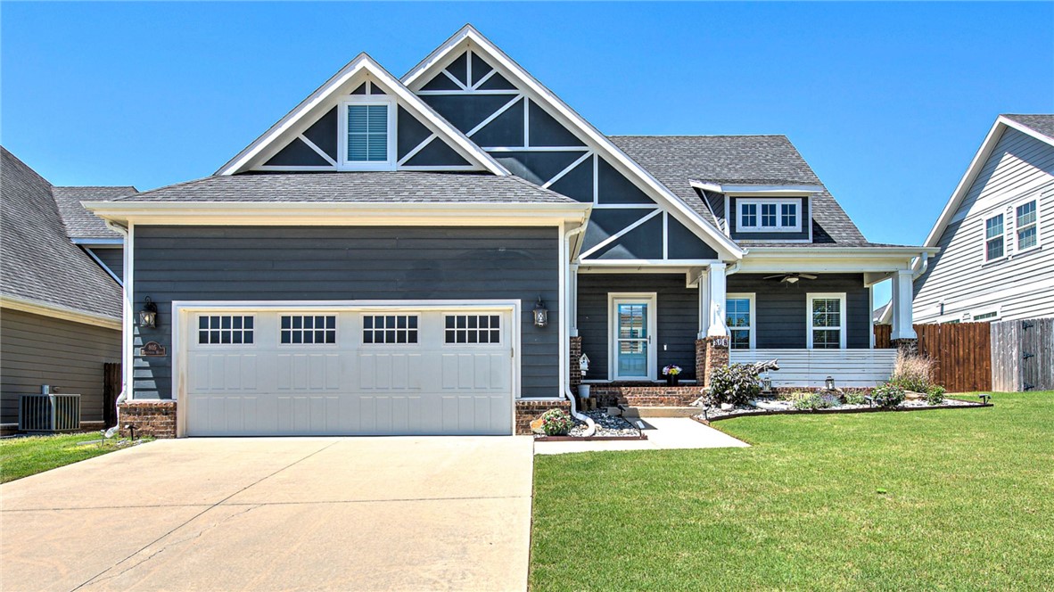 This Hyde Park Craftsman brings together thoughtful design, everyday function, and a location that keeps everything within easy reach in NWA. Inside, the main living area is open and inviting, anchored by a fireplace and filled with light. The kitchen features granite counters, stainless appliances, gas cooktop, walk in pantry & easy flow into the dining space. The main level features a dedicated office with French doors and a private primary suite complete with coffered ceilings, a spa-style bath with whirlpool tub, walk-in shower, dual vanities, and a closet with direct laundry room access. Upstairs you'll find three large rooms & full bathroom. The backyard is its own retreat with privacy and firepit. Recent updates like fresh paint, updated flooring, plantation shutters, new stair carpet, storm doors & a 2020 HVAC system with air purification. All of this in one of Cave Springs’ most loved neighborhoods, where homes rarely stay available for long.