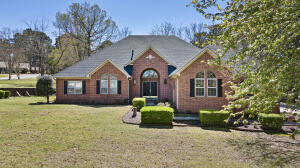 Welcome to your dream home in West Russellville! Boasting of 3100 square feet of luxurious living space, featuring 3 bds & 2.5 baths, along with 2 spacious living areas! Enjoy the tranquil ambiance of the sunroom, or unwind in the comfort of your own private backyard retreat. 14 foot ceilings in main living areas, this home exudes elegance and style, complemented by fresh paint & fixtures that create a modern and inviting atmosphere. Remodeled kitchen - showcasing new countertops, backsplash & appliances that elevate the culinary experience. Conveniently equipped with a 3-car garage, this property offers ample storage space and a NEW ROOF! . VA approved buyers could qualify for an assumable loan at a 2.3% interest rate!