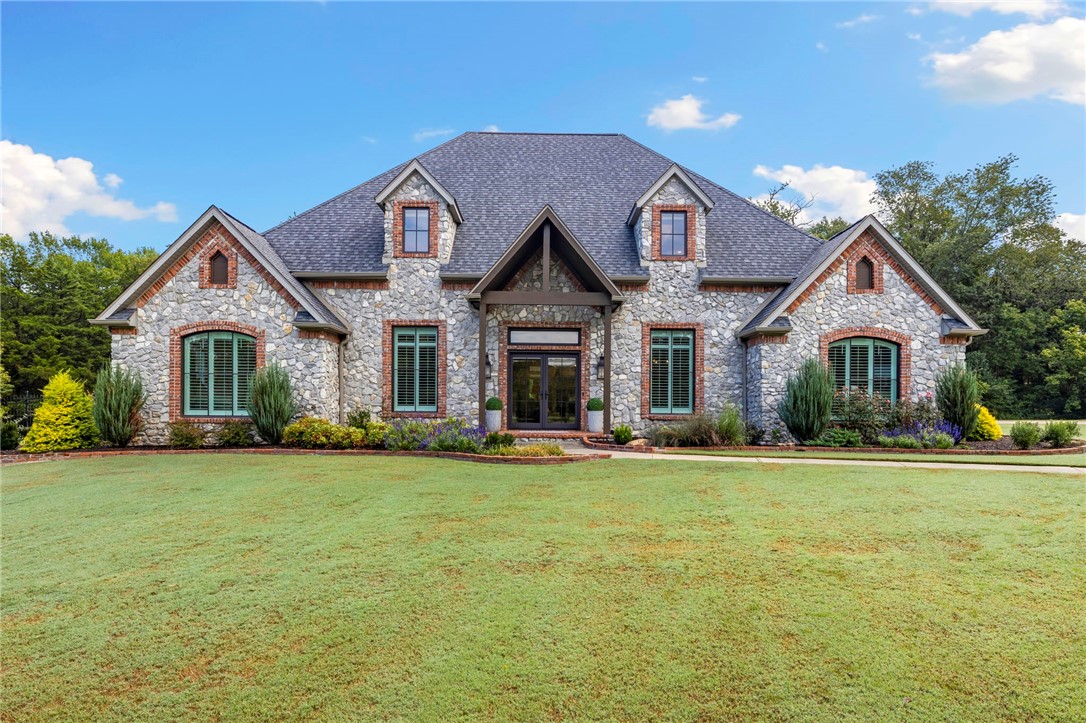 Welcome to 596 Polo Drive — an exceptional estate in the prestigious Polo Country Estates subdivision. This sprawling 4,469 sq ft 2-story home is situated on approximately 3.3 acres and offers a rare blend of elegant living and outdoor enjoyment. 4 bedrooms, 4.5 bathrooms with a thoughtful split floor plan providing space and privacy. Gourmet kitchen featuring granite countertops, ample counter space, custom cabinetry, and a pantry — perfect for entertaining. Inviting living areas with abundant natural light and open flow between spaces. Serene outdoor amenities include a private pond, sparkling pool, and extensive grounds surrounded by nature — ideal for outdoor living, gatherings, or relaxation.  Located just minutes from Fayetteville’s amenities and within easy reach of outdoor recreation opportunities. This distinguished property combines upscale comfort with peaceful estate living in one of the area’s most desirable neighborhoods.