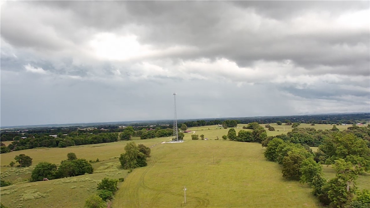 Discover the perfect blend of privacy, beauty, and opportunity with this stunning 40 acre property in Spring Valley. Partially wooded with a mix of open ground and mature trees, this land offers multiple ideal building sites for your dream home, barn for your animals or flat land for your garden. Enjoy country views in every direction and the peaceful atmosphere of rural living, all while having plenty of space to explore or simply relax. Whether you’re looking to build now or invest for the future, this versatile acreage provides the perfect setting for quiet country living with room to roam.

Will need to dig a well. Cell phone tower is not a part of the acreage that is selling. 

Subject to new survey and parcel split. Cross listed with surrounding acreage on MLS#1348653.
