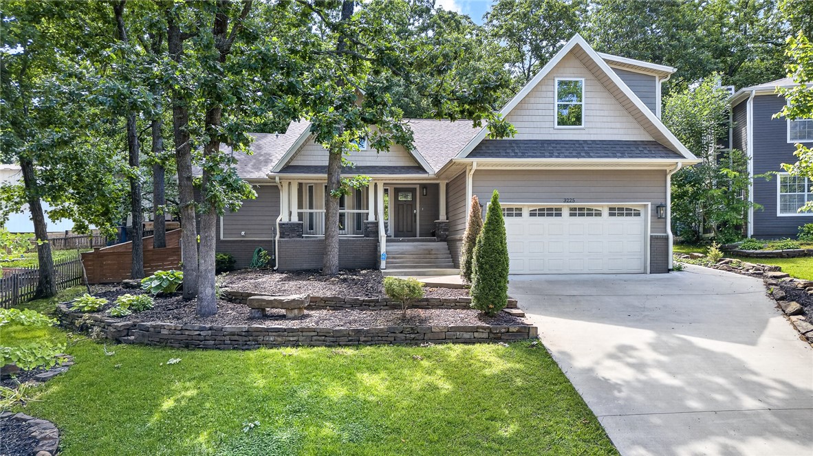 Tucked into a well-established Fayetteville neighborhood, this Craftsman-style home offers a thoughtful layout and elevated finishes throughout. The main level features an open-concept design that flows seamlessly from the living area into a well-appointed kitchen with granite countertops, gas cooktop, double ovens, and a farmhouse sink, ideal for both everyday living and entertaining. Upstairs, a media or flex area provides additional room to relax, work, or gather.
Outside, step into a private, fully fenced backyard complete with a pergola and attractive stacked stone retaining walls, creating a functional and inviting outdoor space. 
A well-rounded home with character, space, and features that are hard to find all in one place.