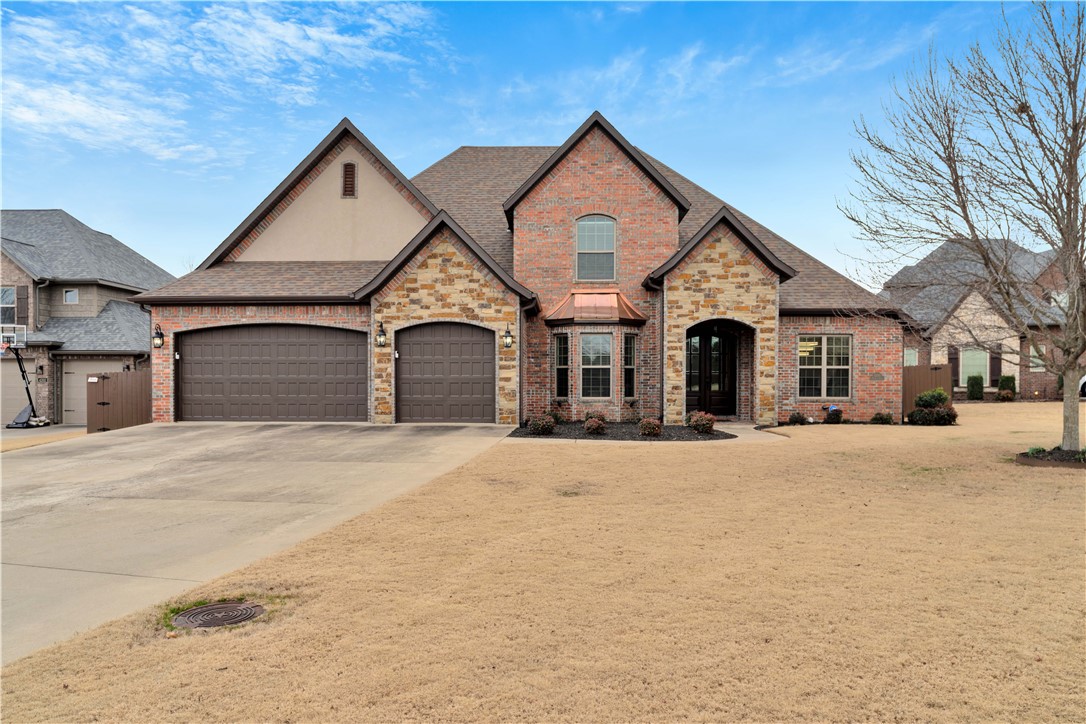 This exceptional residence, located in Woods Creek-one of Bentonville’s premier neighborhoods, offers 5 BRs & 4 BAs. The spacious, open living room and kitchen are equipped w/upgraded appliances and adjoin a formal dining room. The primary BR is situated on main level, w/sitting area and elegantly appointed BA. Upstairs, a large media room, guest BRs w/ample space for entertainment & visitors. Owner has maintained the property meticulously, including fresh interior paint, new hardwood floors upstairs, and new carpet in media room and stairways. Enhanced lighting throughout-LED fixtures, LED recess lighting w/nightlights, smart light switches+smart thermostats, and 2 fully functional bidet seats on the main level. Recent updates within the last 2 years include replacement of the roof, gutters, garage doors, front metal roof, as well as power washing & re-staining of the fence & refurbishment of the front door. This impressive home is conveniently located near all that Bentonville has to offer.