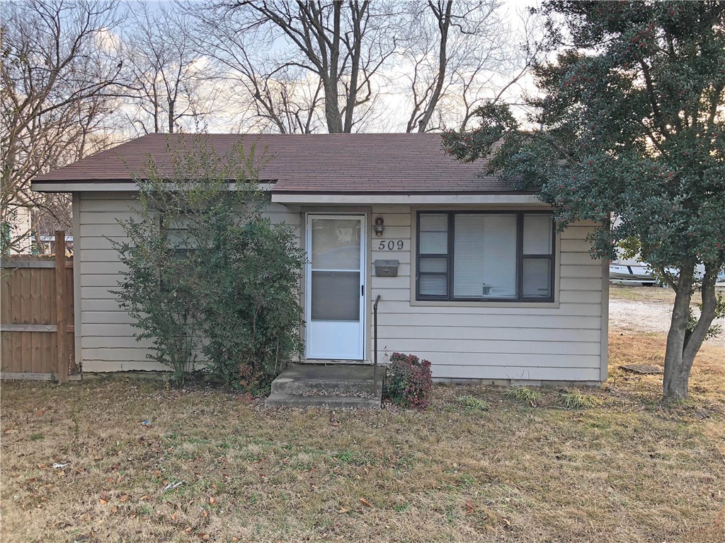 Cute home in very convenient spot near shopping, restaurants and downtown. Well maintained on a large double lot. Nice kitchen with plenty of cabinet space. Wood flooring throughout. Great deck in the back to grill out or relax on. Large workshop and over-sized storage building convey. Why rent an apartment when you could own. Come see this great find!