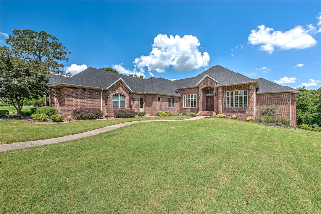 Welcome to this elegant single-level home with beautiful tall windows that accent this landscaped 3.8 AC lot in Talamore Subdivision. Enjoy a large island kitchen w/ newer appliances, walk-in pantry and walk-in wine cooler. Each bedroom with its own full bath. Private backyard with large entertaining deck with views and saltwater pool. Property is 15 minutes to Walmart Headquarters.