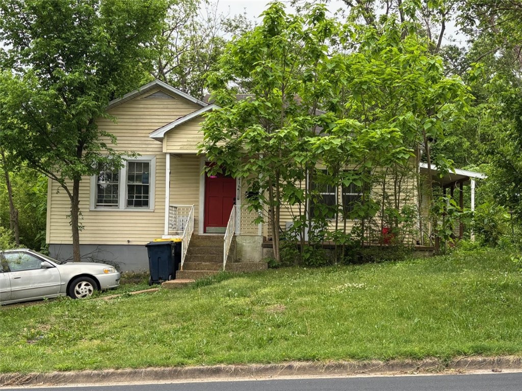 Check out this 2BR/1BA cottage on the edge of Harrison business district. A short walk to the Courthouse Square, Lake Harrison, and numerous shopping and restaurant locations. Wood and vinyl floors, original wood interior trim, large living room, full unfinished basement. Needs work and is priced accordingly, but it could be a great full time residence, Air BnB, or full time rental. Age is an estimate.