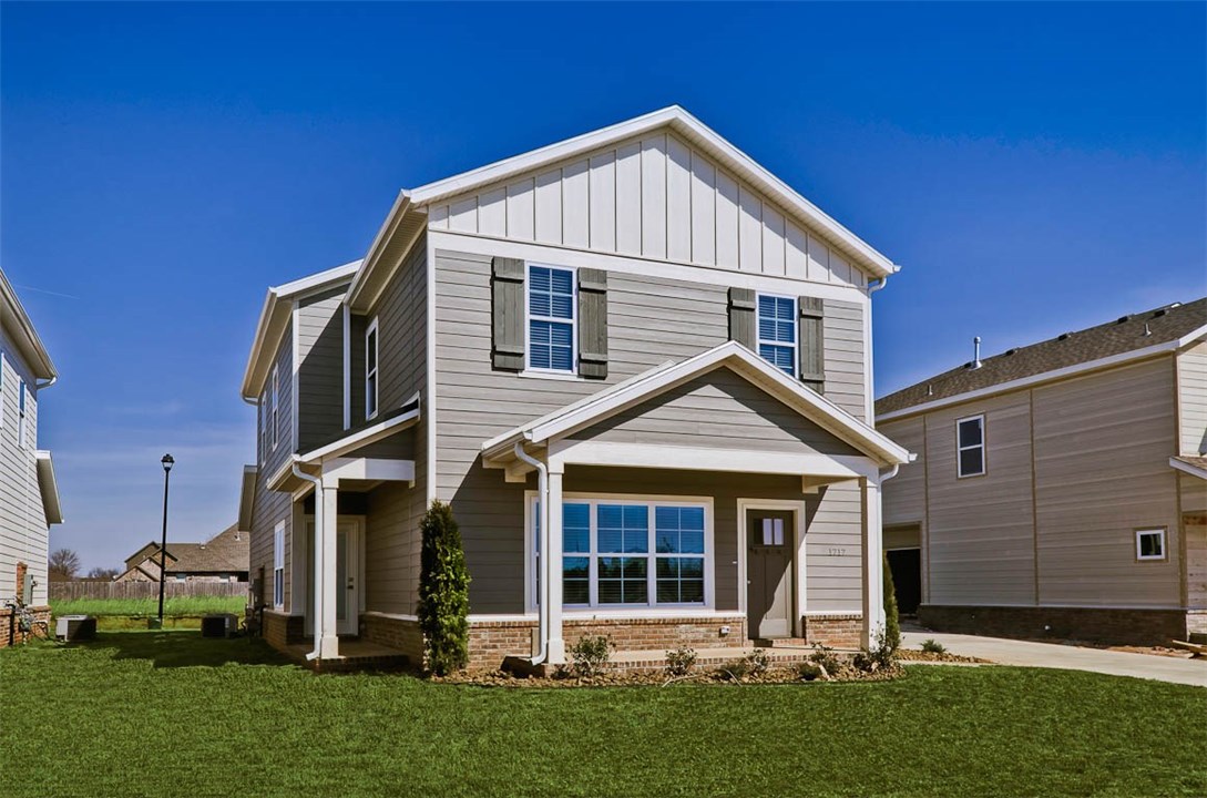 THE GROVE NEIGHBORHOOD IN ROGERS. Modern luxuries are embodied in these 3 bedroom 2.5 bath homes. Craftsman style homes with desirable open floor plans for entertaining. This home feature custom cabinets, granite counter tops with under mount sinks, stainless appliances, gas range, pantry, fireplace  Refrigerator, Washer & Dryer to convey at zero value.  $2,500 in buyer's closing cost paid by seller at closing.