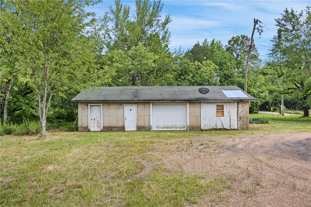 If you're looking for a solid commercial space with room to grow, check out this property at 10001 Alpha Road in Dardanelle. Sitting on just under an acre, this 1,056 square foot building was previously used as a car lot and is built with poured concrete forms—sturdy and low maintenance. The electrical system has been completely updated, so you're starting fresh. The property has an active well, and city water is available at the street if you prefer to hook in. Plenty of room outside for parking, displays, or whatever your business needs. Now offered at just $99,000.00, it’s a great spot with tons of potential and flexibility for your next venture. Property being sold as is.