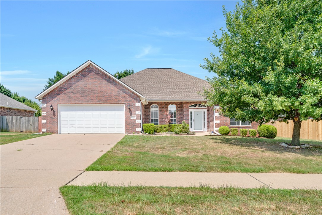 Welcome to this beautifully maintained 4-bedroom, 2-bath home in Bentonville, where comfort and functionality come together in a layout designed for everyday living. A spacious living area creates an inviting space to relax or entertain, while the kitchen offers a pantry, generous workspace, and an easy flow into the dining area for effortless meals and gatherings. The private primary suite features its own bathroom and a walk-in closet, providing a peaceful retreat from the rest of the home. A bright sunroom extends the living space and is perfect for enjoying your morning coffee, working from home, or unwinding with views of the backyard. Outside, the backyard offers plenty of room for entertaining, gardening, play or simply enjoying the outdoors. Ideally situated within walking distance to Wildwood Park, tennis courts and just minutes from the community center, schools, shopping, dining and everyday conveniences, this home offers an exceptional lifestyle in one of Bentonville's most desirable locations.