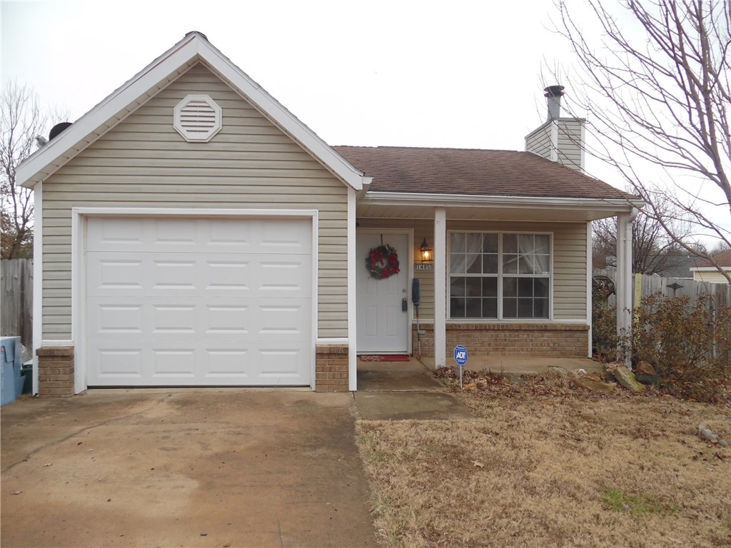 Fabulous 2 bedroom/2 Bath home in the middle of town and convenient to everything.  Hardwood like flooring and ceramic tile throughout this charming home.  Living room features vaulted ceilings and a wood burning fireplace to cozy up to.  A covered front porch and side patio are sure to enhance the outdoor space.  Come see!