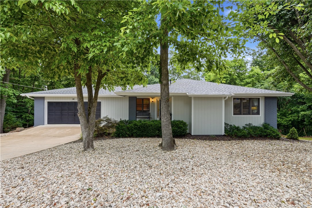 *(2 Bedroom Septic- See Plat Map) Immaculately kept remodeled home! Covered front porch, large extra-wide galley-kitchen, Onyx countertops throughout, undercabinet lighting in kitchen, crown molding, Wi-Fi controllable thermostat, 3 living areas, heated tile in primary bathroom, and a huge 20x12 handyman workshop! Tons of extra storage and there's even a safe-shelter room for bad weather. Winter lakeview of Loch Lomond, and only a few minutes to nearest boat launch. Big composite deck on main-level and lower-level patio is screened-in. Roof replaced in 2025. This home shows like a dream and is in move-in condition!