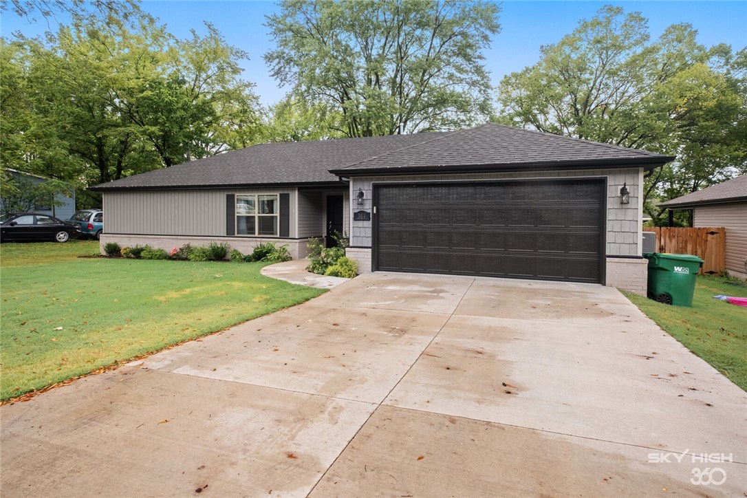 RD Eligible!! This gorgeous Roth built home is only 1 year old, basically new construction! Located just 1 block from Main St in Centerton and only a few steps from the Centerton City Park, food trucks, and shopping. Home features open, split floor plan has 3 bd, 2 bt, and a 2 car garage. Great curb appeal with partial brick and siding combo, architectural shingles, professional landscaping and upgraded black front and garage doors. This home offers a very open, high-end kitchen, complete with quartz counter tops, custom backsplash, high end cabinetry, and slate finish stainless steel appliances. High quality waterproof vinyl flooring throughout entire home, no carpet! Large master bedroom with beautiful en-suite. Master bath includes matching quartz counters and cabinets, toilet closet, and large walk-in closet with built-ins. Over sized, private and flat, fenced-in backyard with beautiful mature tree! Great layout, making the home feel larger than it is! Don't miss out on this one!!