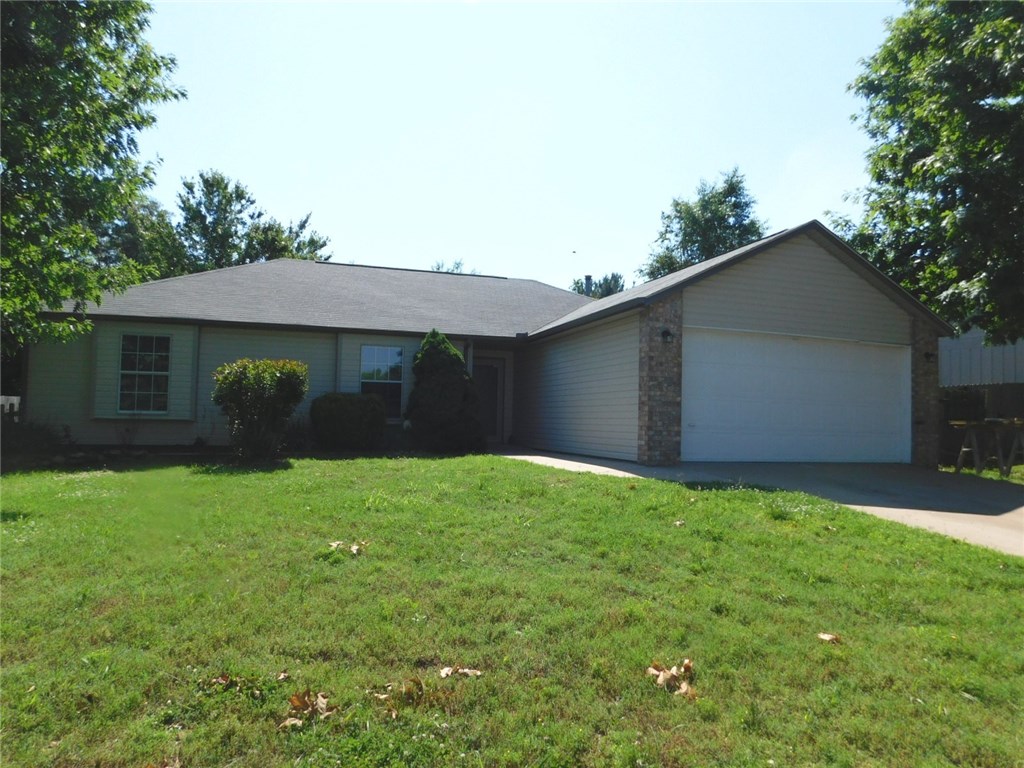 Great shape! 3 BR, 2 BA, 2 car garage home in west Fayetteville. This home features new paint inside, floor coverings and a new range. Move-in ready & just minutes to I-49. Agent owned. Will not go FHA due to 90 day flip rule