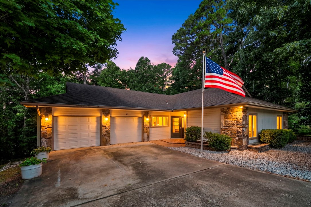 Opportunity awaits on this rare .73-acre lot with direct access to Bella Vista's renowned trail system! Gently sloping and highly usable, this oversized homesite backs to miles of scenic biking and hiking trails, offering privacy, adventure, and an unbeatable outdoor lifestyle right from your backyard. The home is ready for your personal updates, making it the perfect opportunity to renovate, invest, or create your dream retreat in one of Bella Vista's most desirable recreational locations. Enjoy peaceful, wooded views, abundant outdoor living space, and easy access to Blowing springs, Little Sugar Trails, Huntley Gravity Park, OZ Trails Bike Park, Back 40, Tunnel Vision Trails, and countless miles or world-class mountain biking. Bentonville Schools. Bring your vision and make this exceptional property your own.